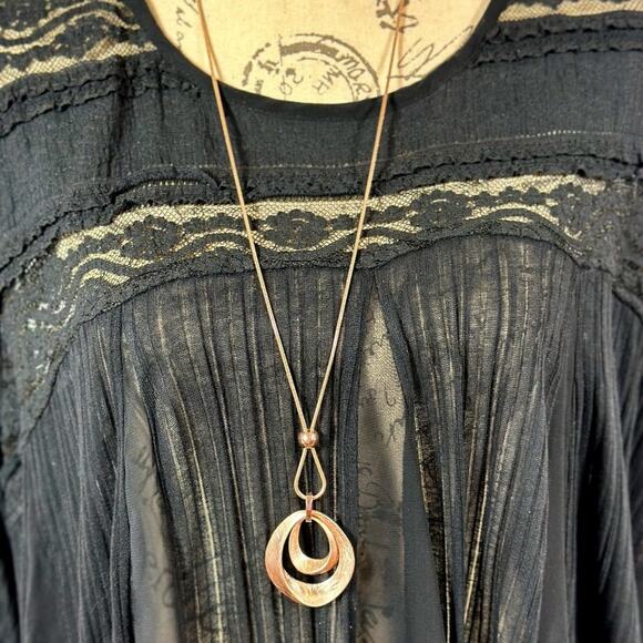 Gold Waterdrop Brushed Pendant on a Gold Rope Chain - Picture 11 of 13